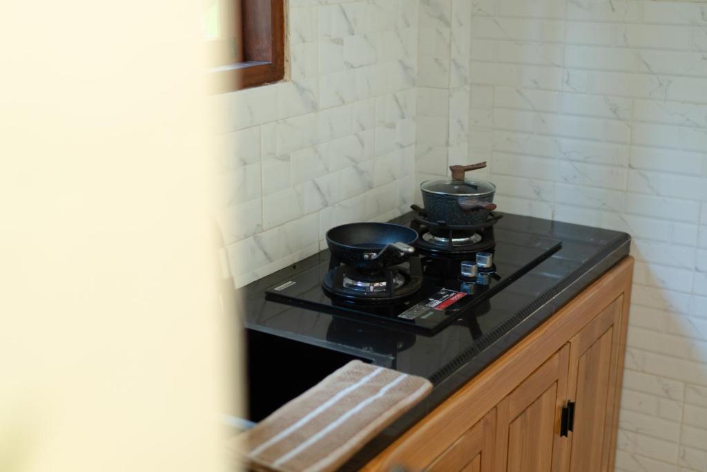 Kuchyň nebo kuchyňský kout v ubytování Baran Swaha Villa