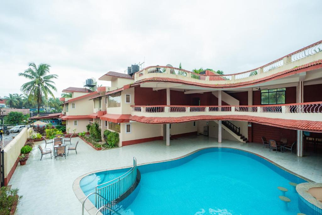 Bazén v ubytování Treebo Sunshine Beach Resort nebo v jeho okolí