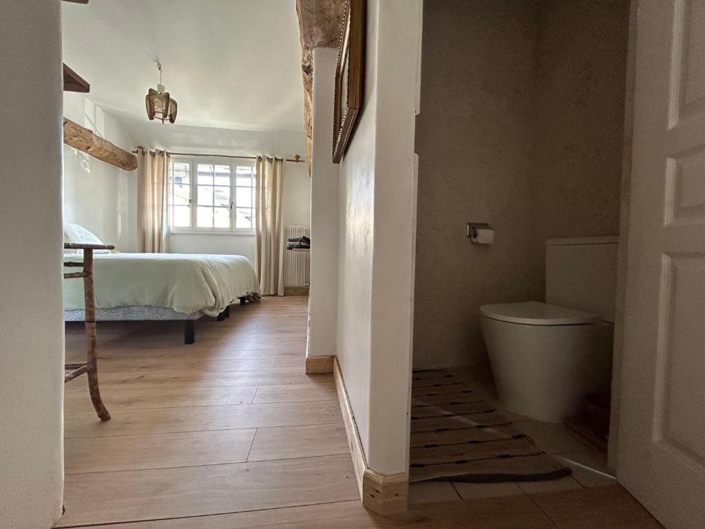 Postel nebo postele na pokoji v ubytování Chambres d'Hôtes Manoir Du Chêne