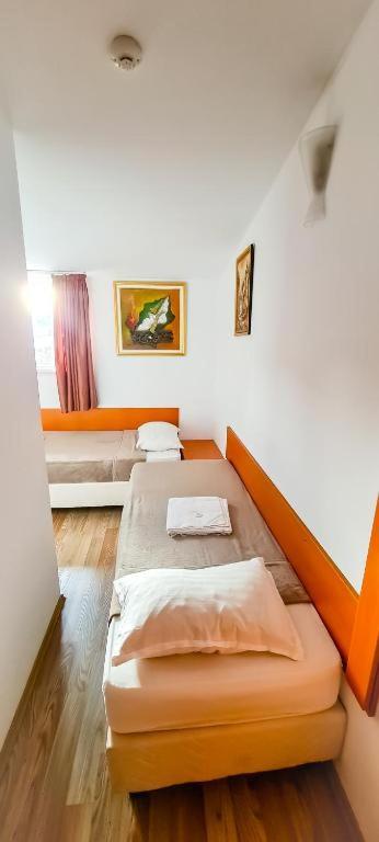 Postel nebo postele na pokoji v ubytování Casa Michelangelo