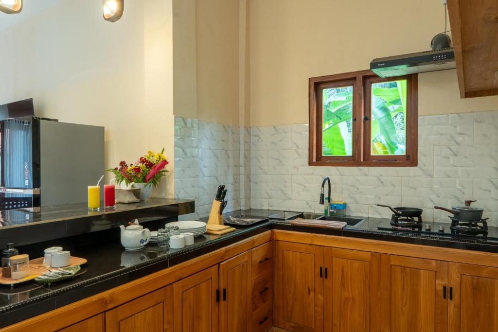 Kuchyň nebo kuchyňský kout v ubytování Baran Swaha Villa