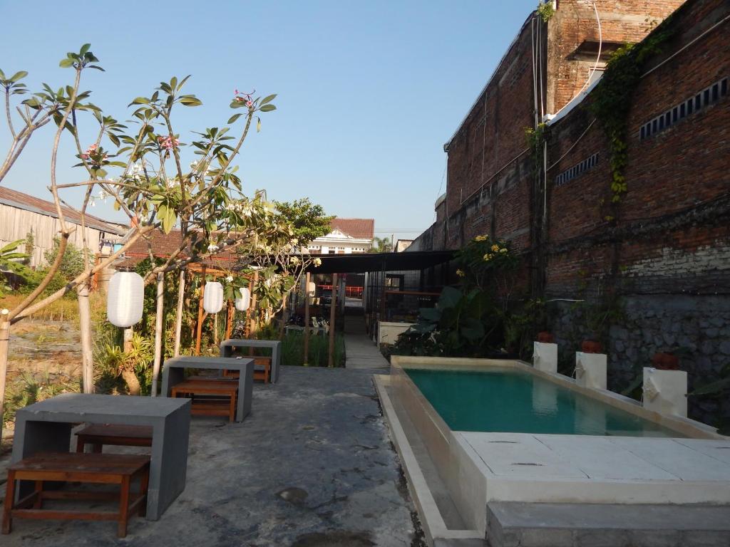 Bazén v ubytování Rosella Cottages - Homestay - Yogyakarta nebo v jeho okolí