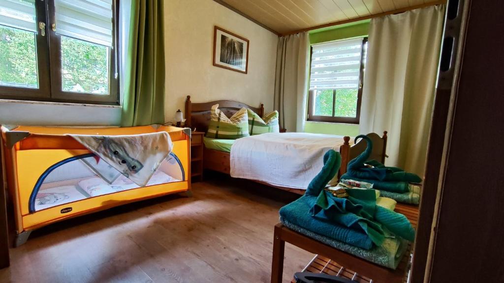 Postel nebo postele na pokoji v ubytování ansimali