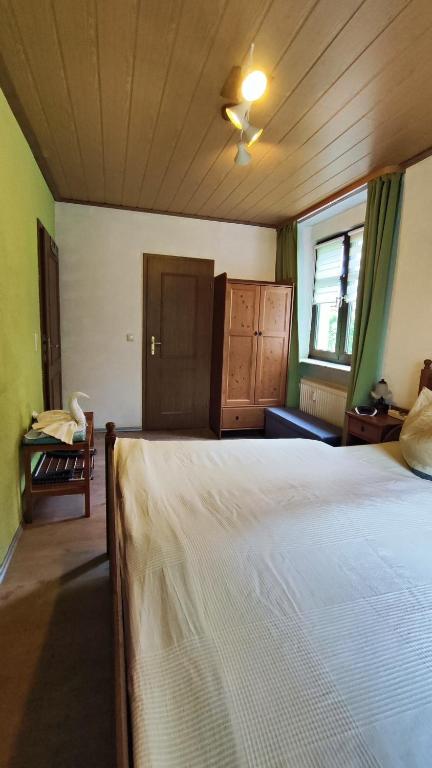 Postel nebo postele na pokoji v ubytování ansimali