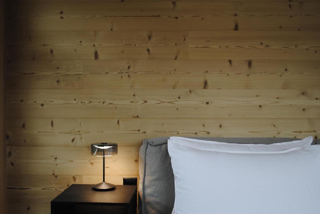Postel nebo postele na pokoji v ubytování Boutique Hotel Casa Giovanoli