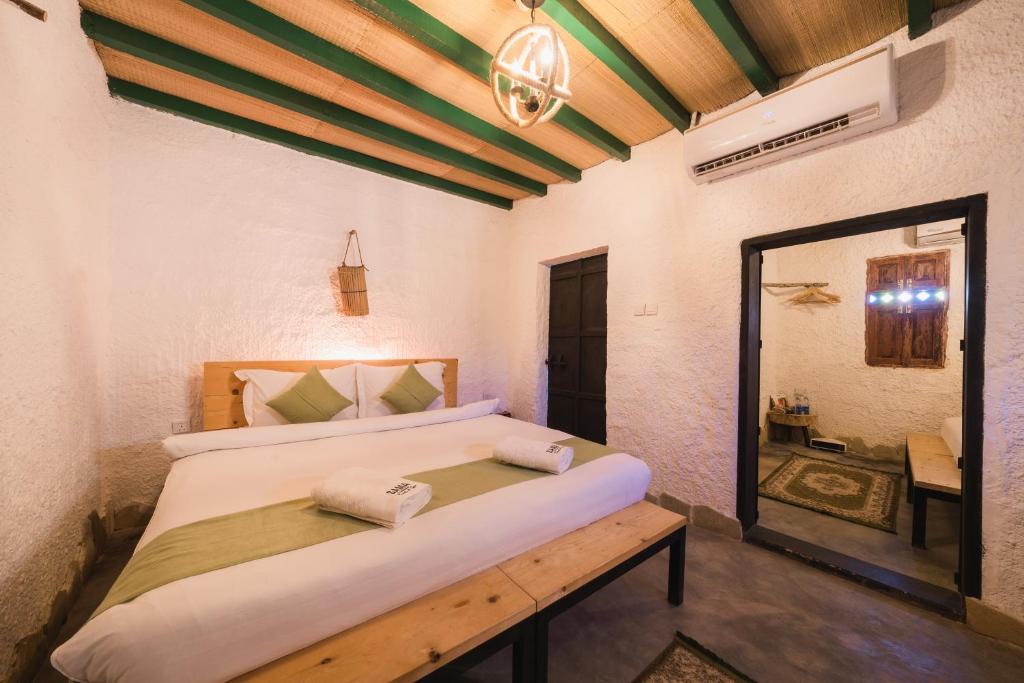 Postel nebo postele na pokoji v ubytování SAMA Wakan Heritage Homes