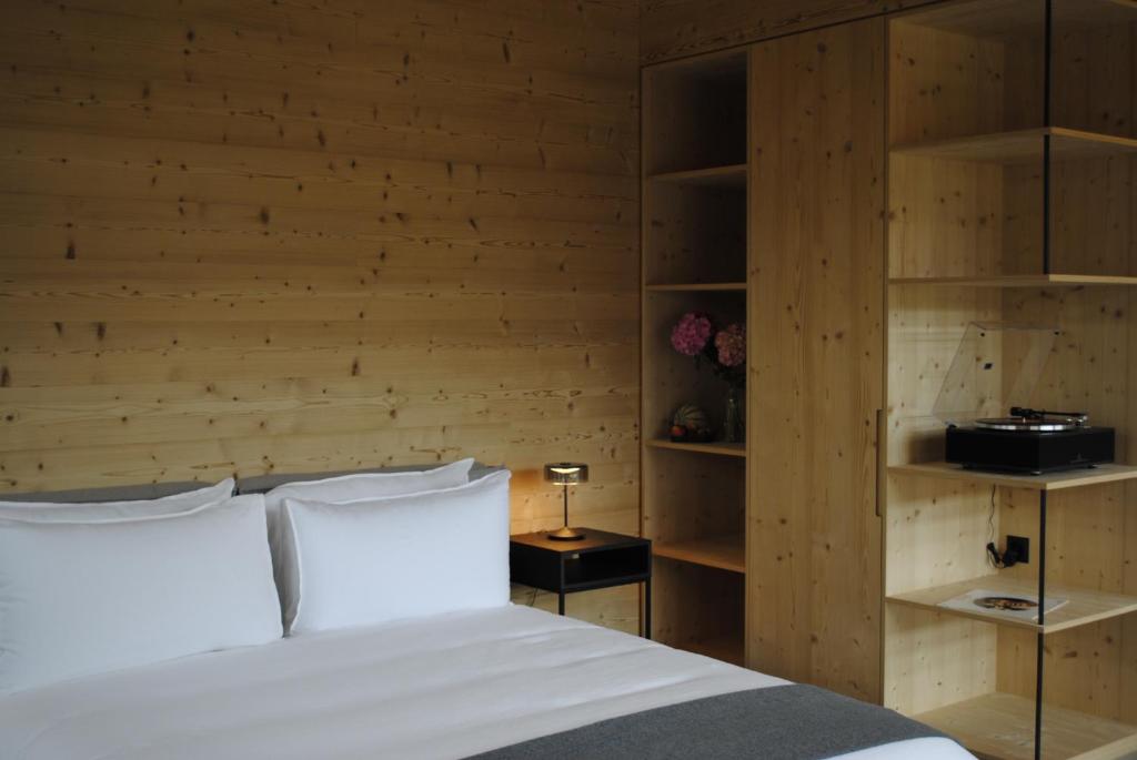 Postel nebo postele na pokoji v ubytování Boutique Hotel Casa Giovanoli