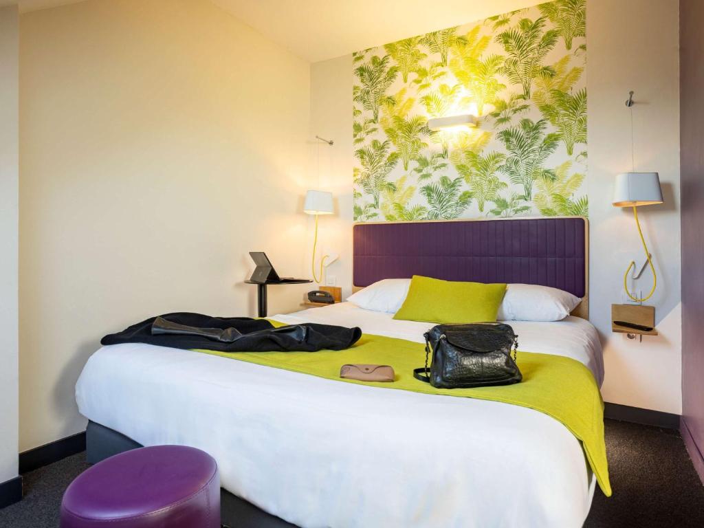 Postel nebo postele na pokoji v ubytování ibis Styles Calais Centre