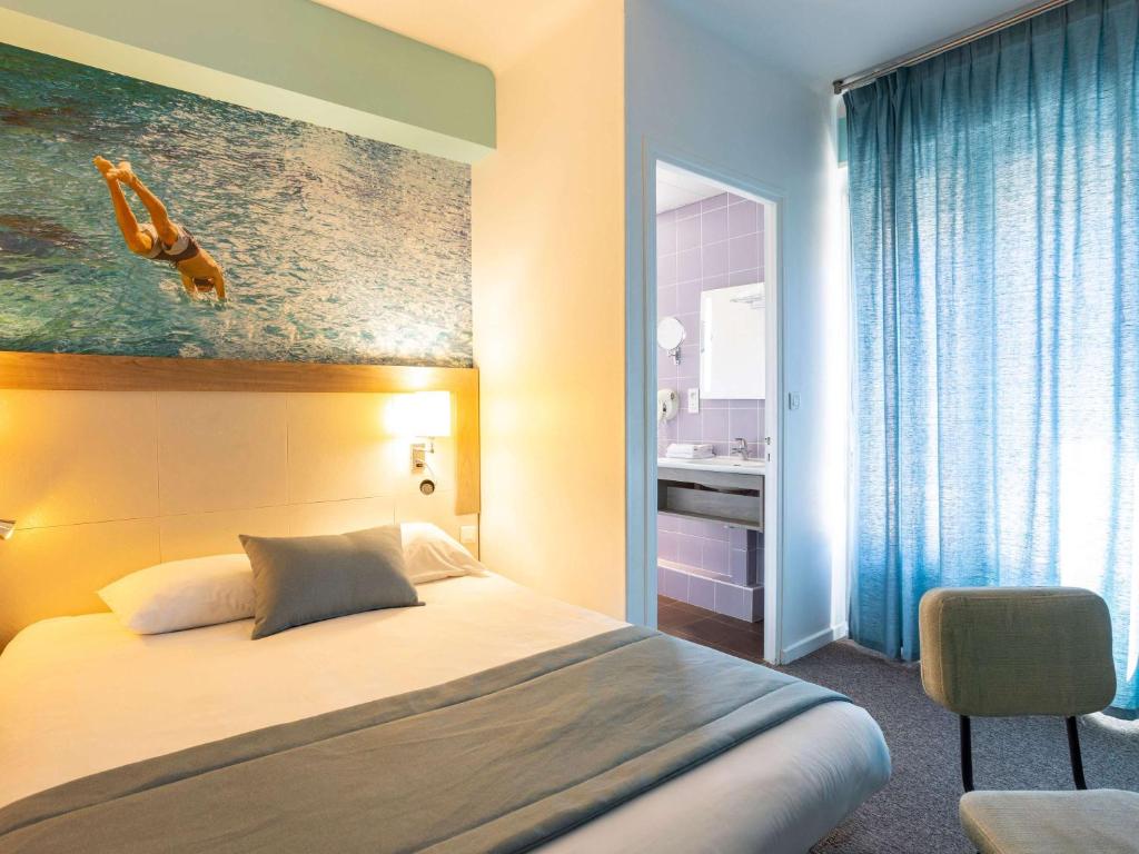 Postel nebo postele na pokoji v ubytování ibis Styles Calais Centre