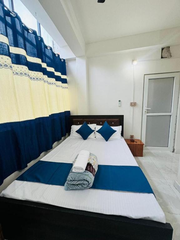 Katil atau katil-katil dalam bilik di Hotel Pema