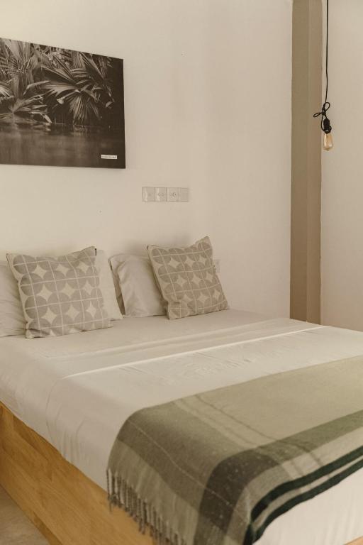 Postel nebo postele na pokoji v ubytování Taboo