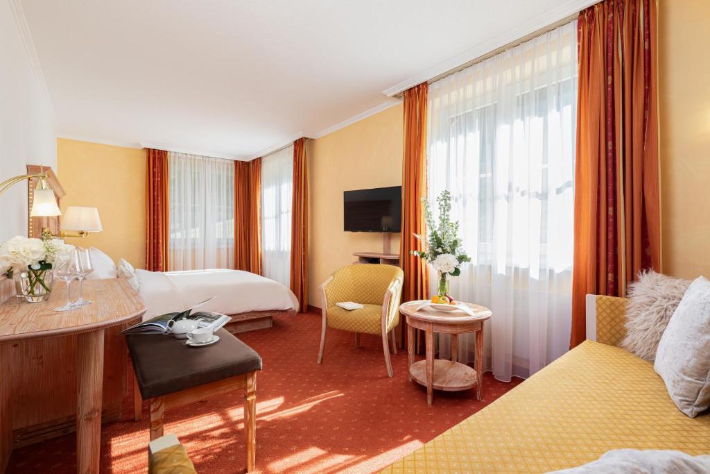Postel nebo postele na pokoji v ubytování Hotel Restaurant Waldhaus