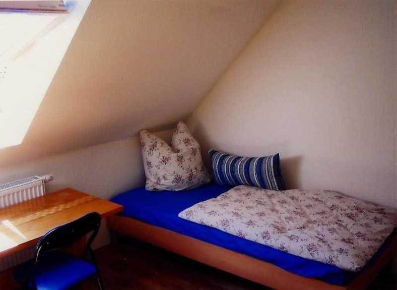 Postel nebo postele na pokoji v ubytování Ferienwohnung am Kreßinsee