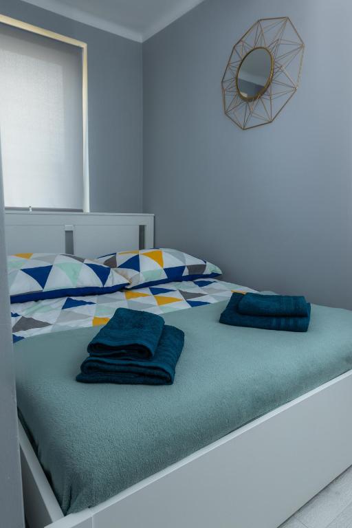 Posteľ alebo postele v izbe v ubytovaní Lovely place-apartament Oświęcim