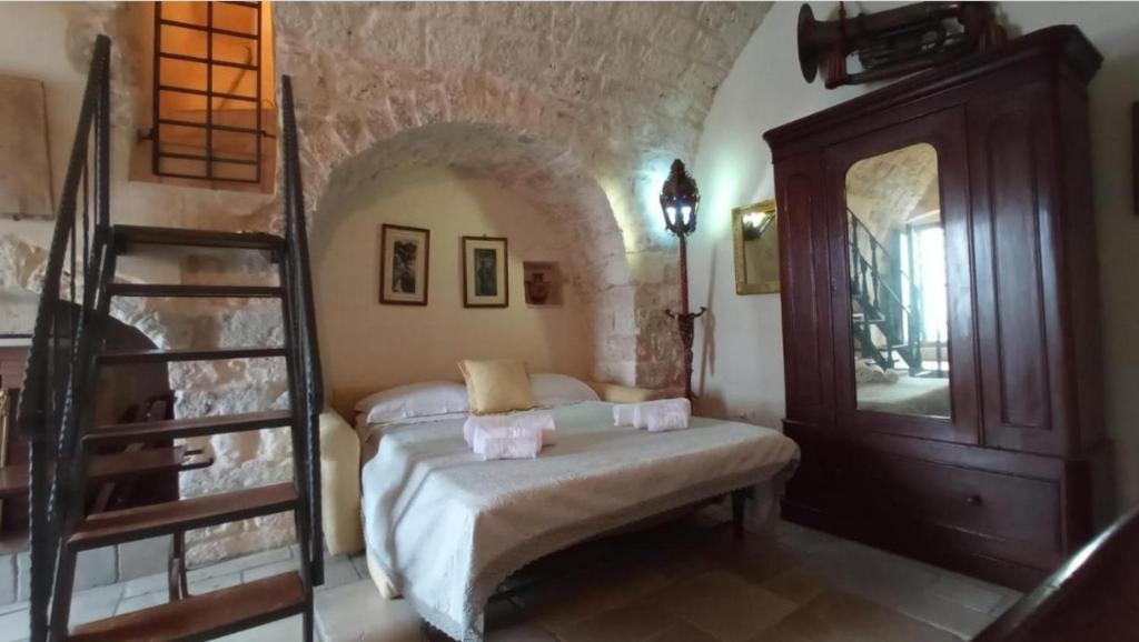 Ένα ή περισσότερα κρεβάτια σε δωμάτιο στο Appartamenti del Re