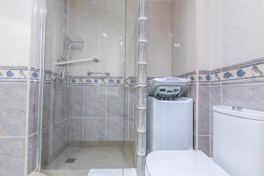 A bathroom at Apartment in beachfront complex in El Duque area, Costa Adeje