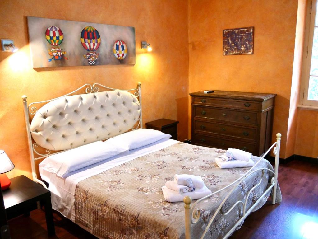 Postel nebo postele na pokoji v ubytování L'Antico Granaio Paliano