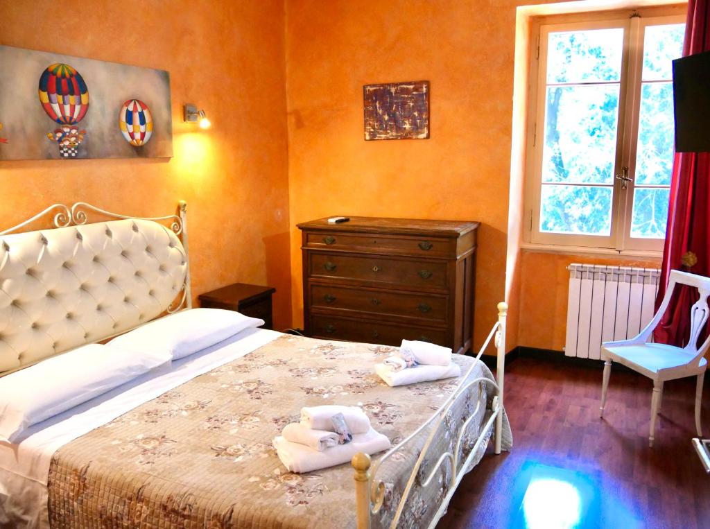 Postel nebo postele na pokoji v ubytování L'Antico Granaio Paliano