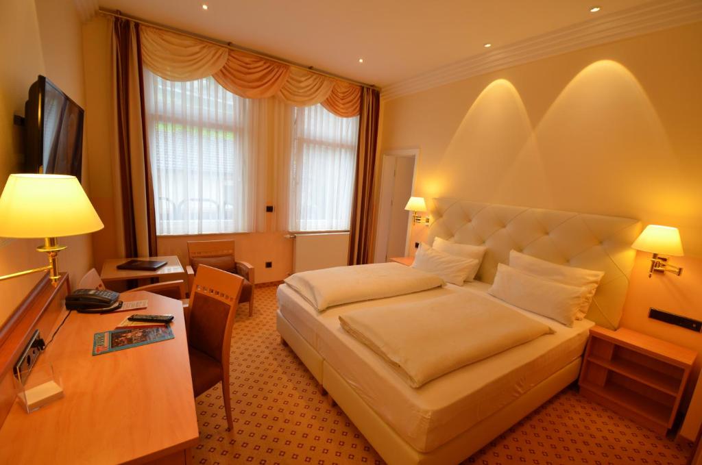 TV a/nebo společenská místnost v ubytování Hotel Mack Private Inn