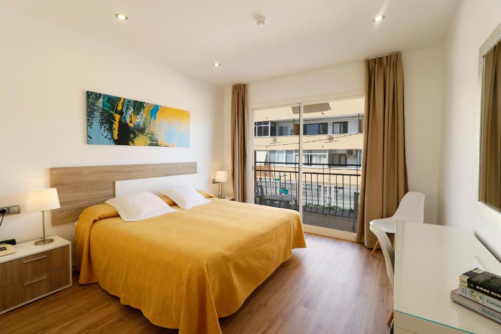 Postel nebo postele na pokoji v ubytování Hotel Gabarda