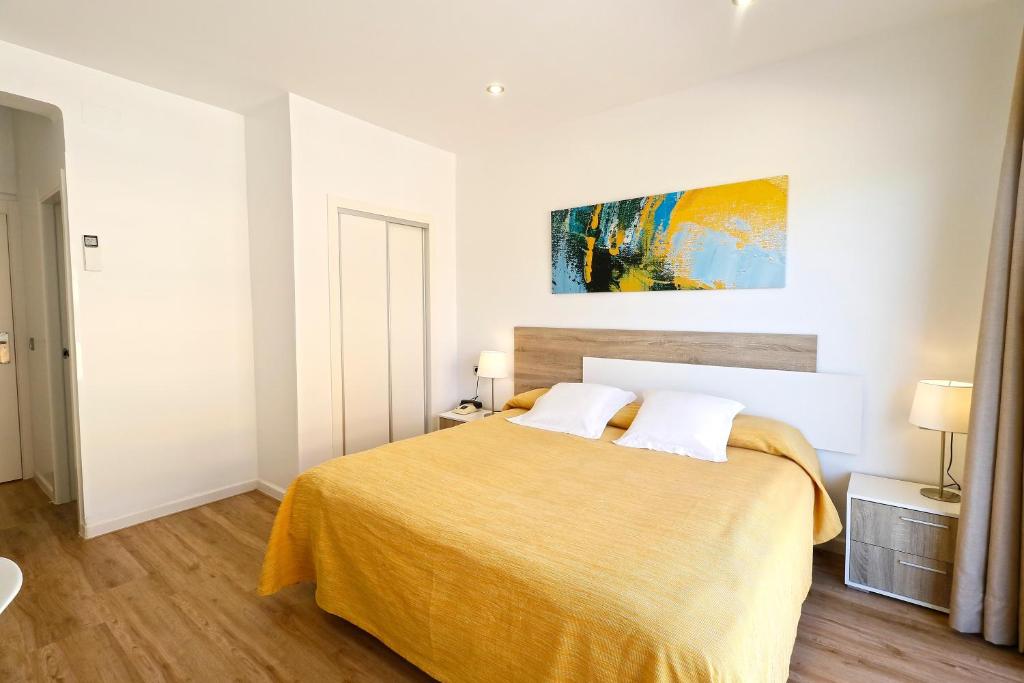Postel nebo postele na pokoji v ubytování Hotel Gabarda
