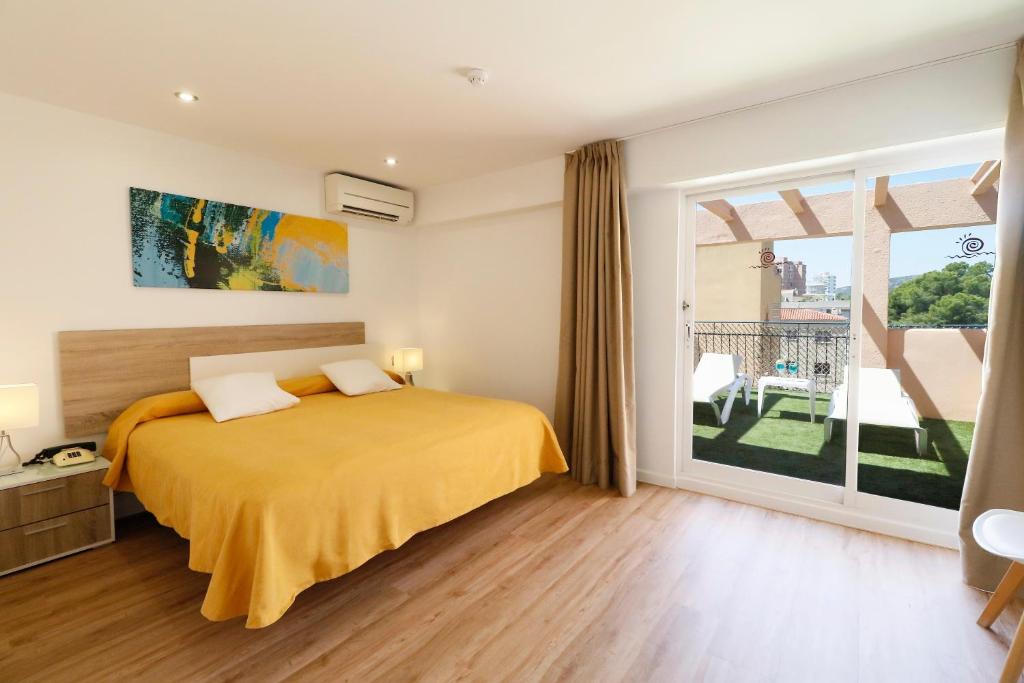 Postel nebo postele na pokoji v ubytování Hotel Gabarda
