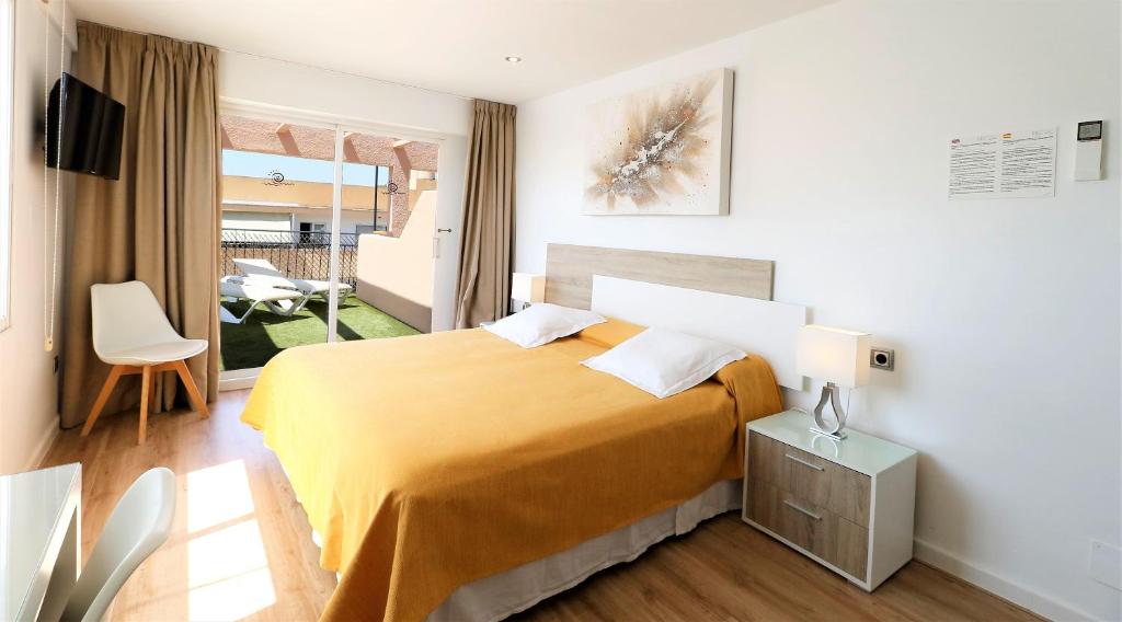 Postel nebo postele na pokoji v ubytování Hotel Gabarda
