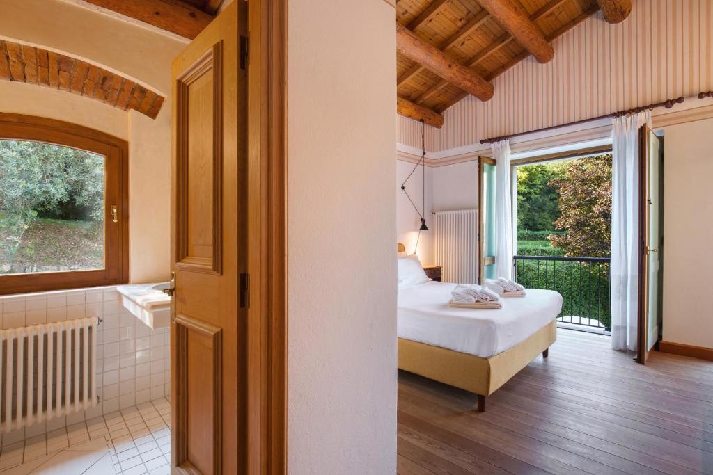 Posteľ alebo postele v izbe v ubytovaní Cà Cantoni With Pool