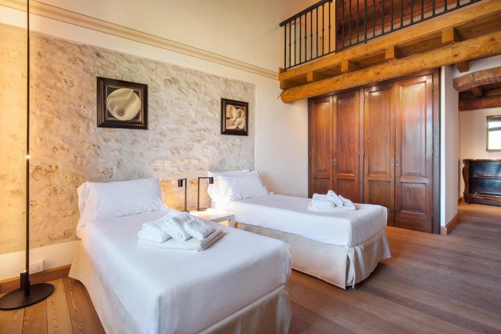 Posteľ alebo postele v izbe v ubytovaní Cà Cantoni With Pool