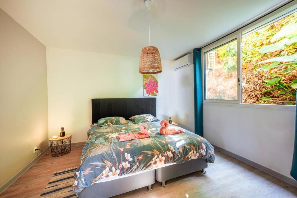 Postel nebo postele na pokoji v ubytování Grande Maison de 8 chambres au sud de"La Réunion"