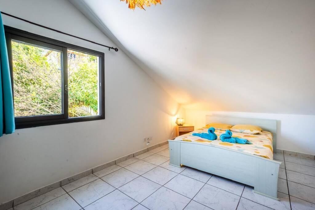 Postel nebo postele na pokoji v ubytování Grande Maison de 8 chambres au sud de"La Réunion"