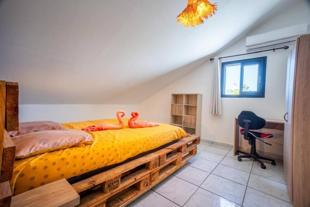 Postel nebo postele na pokoji v ubytování Grande Maison de 8 chambres au sud de"La Réunion"