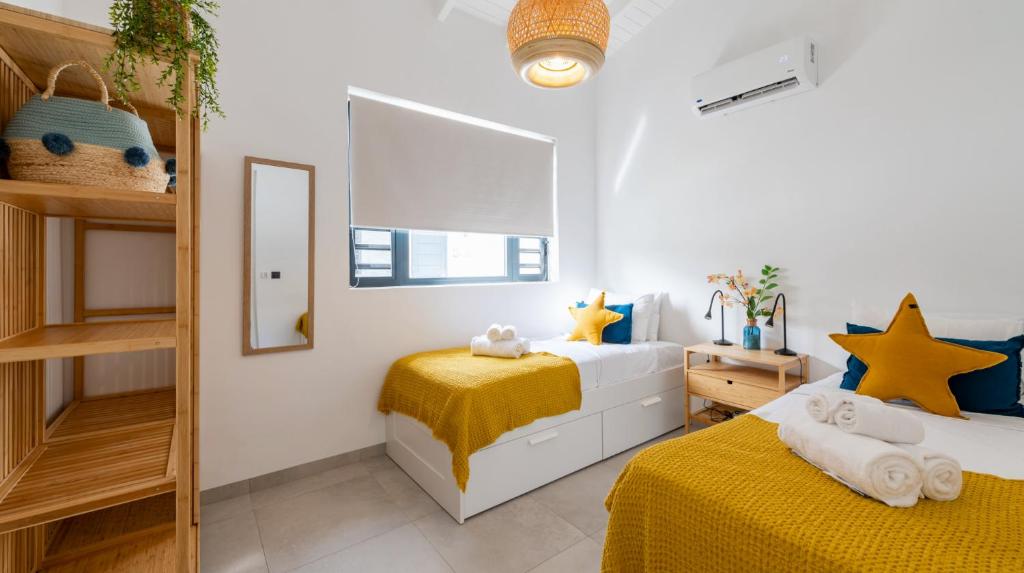 Postel nebo postele na pokoji v ubytování Penthouse Mesa Bonita
