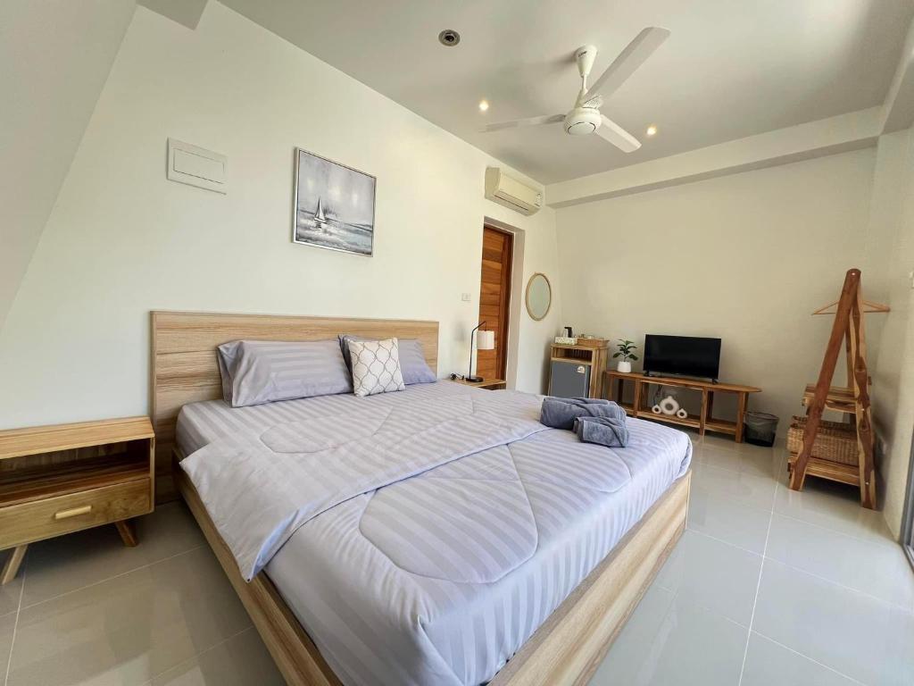 Postel nebo postele na pokoji v ubytování Chill Lay Resort Donsak