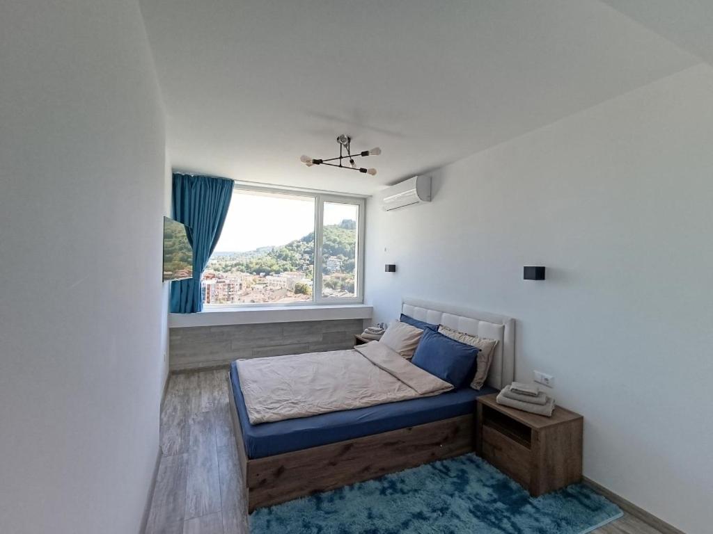 Postel nebo postele na pokoji v ubytování Balkan Tower Deluxe
