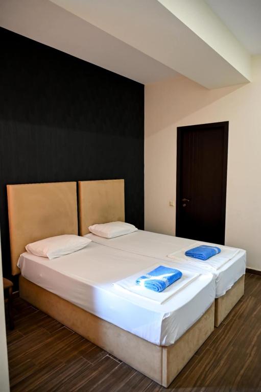 Voodi või voodid majutusasutuse Star Hotel toas