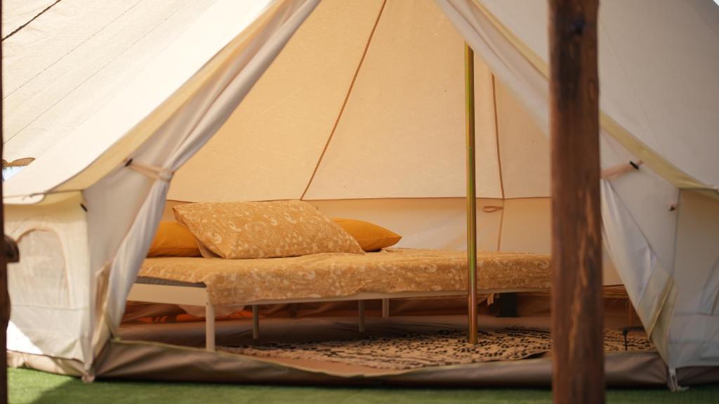 Postel nebo postele na pokoji v ubytování Glamping Di Palma