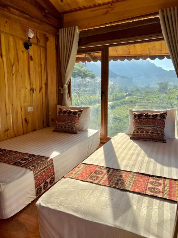 Postel nebo postele na pokoji v ubytování Muong Tra Stream Homestay