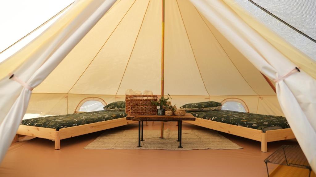 Postel nebo postele na pokoji v ubytování Glamping Di Palma