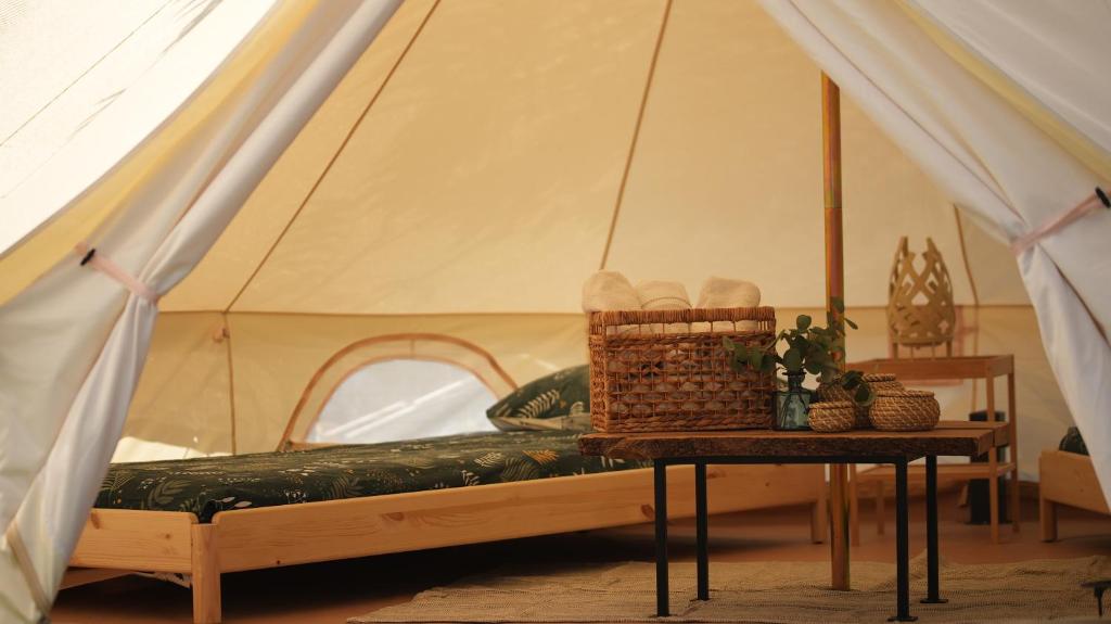 Postel nebo postele na pokoji v ubytování Glamping Di Palma