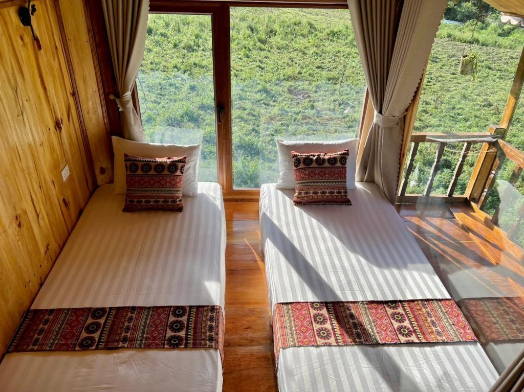 Postel nebo postele na pokoji v ubytování Muong Tra Stream Homestay