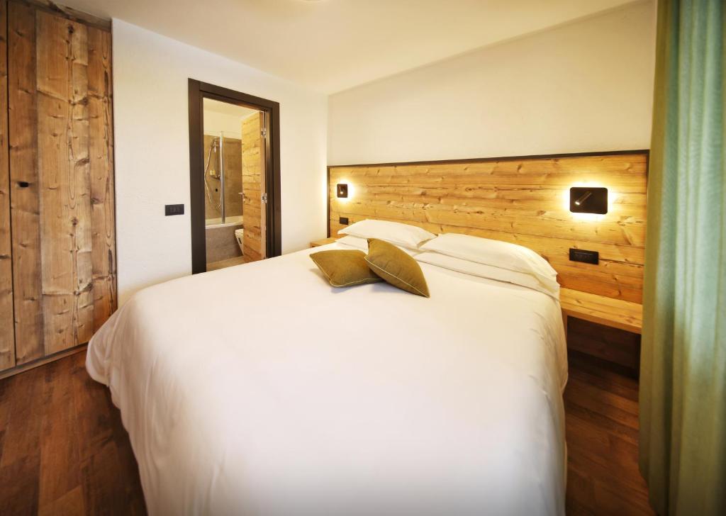Postel nebo postele na pokoji v ubytování TH La Thuile - Planibel Residence