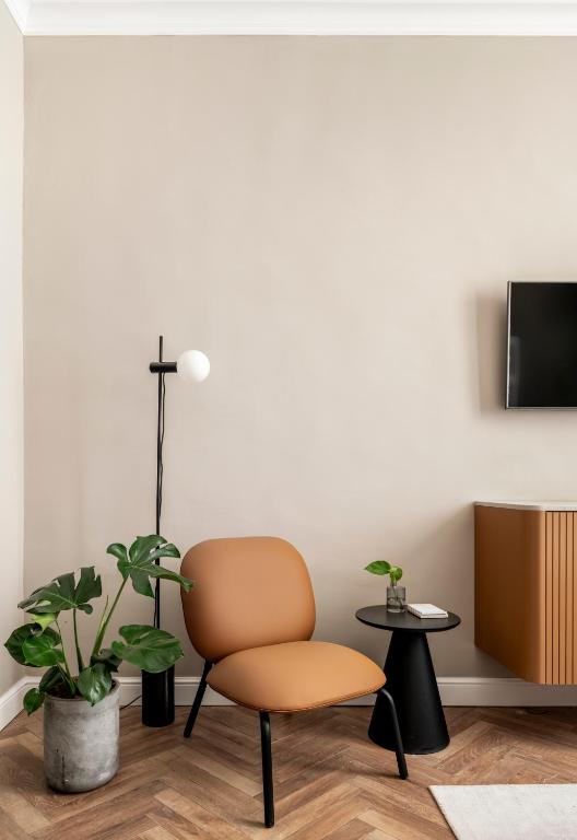 TV a/nebo společenská místnost v ubytování Noel Suites