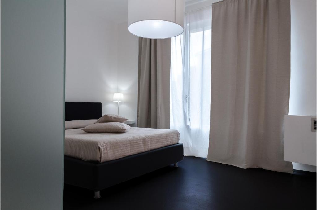 Postel nebo postele na pokoji v ubytování Vittoria Design Hotel di Luce Hotels