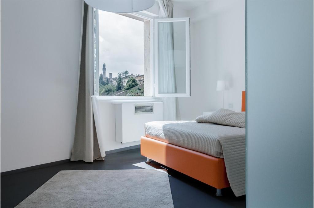Postel nebo postele na pokoji v ubytování Vittoria Design Hotel di Luce Hotels