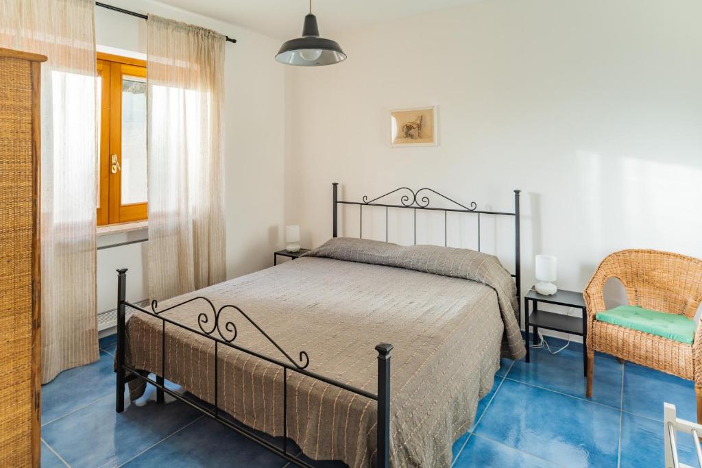 Postel nebo postele na pokoji v ubytování Driùs edodè - b&b affittacamere