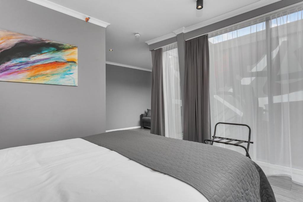 Postel nebo postele na pokoji v ubytování Hotel Aska