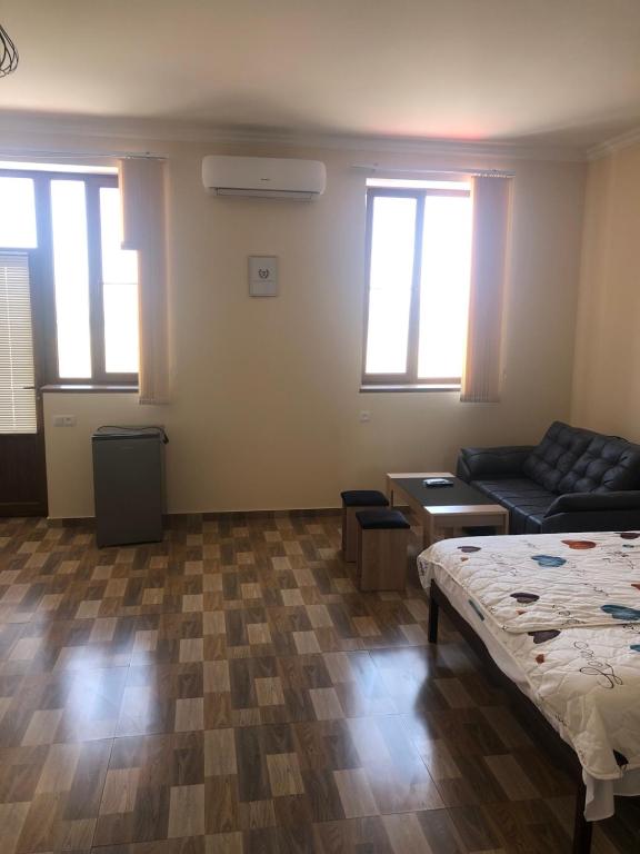 Postel nebo postele na pokoji v ubytování Nigatun Hotel