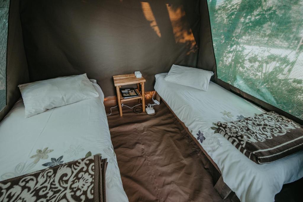 Letto o letti in una camera di Storms River Forest Lodge