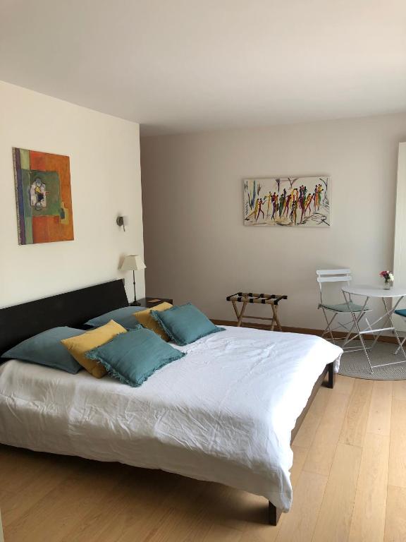 Postel nebo postele na pokoji v ubytování La maison de Nati